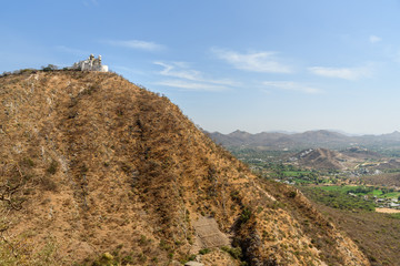 Wall Mural - Monsoon Palace or Sajjan Garh Palace on the hill in Udaipur. India