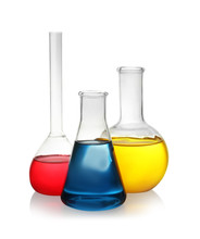 Laboratory Glassware With Colorful Liquids On White Background