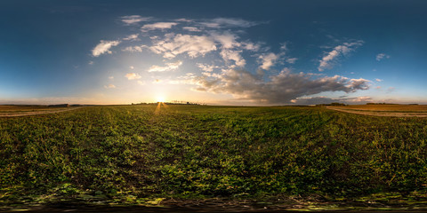 Wall Mural - full seamless spherical hdri panorama 360 degrees angle view in field in summer evening sunset with awesome clouds in equirectangular projection, ready for VR AR virtual reality