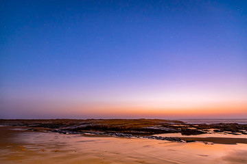 Wall Mural - Sunset in Algarve under clear starry skies