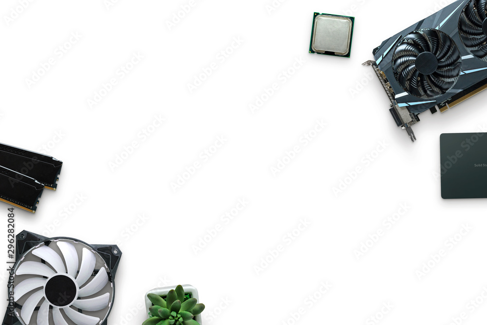 Computer components on a white desk. Graphic card, SSD, processor, RAM ...