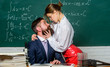 © be free - Its more than flirt. Couple engaged in romantic affair. Romantic love of bearded man and sexy woman in school. Teacher and student in romantic relationship. Romantic partnership