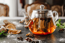Leaf Tea In A Glass Teapot On The Black Table