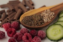 Sample Foods From Low-GI PCOS (Polycystic Ovary Syndrome) Diet. Lentils, Chia Seeds, Sunflower Seeds, Buckwheat Pasta, Raspberries And Cucumber. 