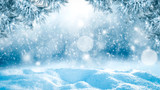 Fototapeta Na ścianę - Blurred snowy winter background with shimmering snow.