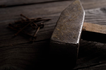 Poster - Different workpieces on a wooden background. Hedge wrenches keys, hammer