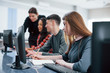 © standret - Everyone doing his work. Group of young people in casual clothes in the modern office