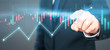 © denphumi - Businessman plan graph growth increase of chart positive indicators in his business