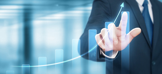 Businessman plan graph growth increase of chart positive indicators in his business