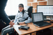© standret - Preparation, putting electrods on fingers. Girl passes lie detector in the office. Asking questions. Polygraph test