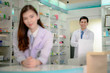 © ID_Anuphon - man and woman stand by in charge in pharmacy drug store