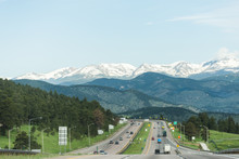American Highway Going Through Snow Capped Mountain Landscape