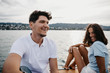 © letizia haessig photography/Westend61 - Happy young couple on a boat trip on a lake