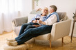 © Prostock-studio - Relaxed senior couple drinking wine, celebrating anniversary