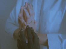 Man Touching Woman's Hands