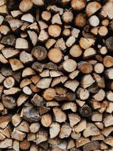 Close Up Of Stack Of Wooden Logs