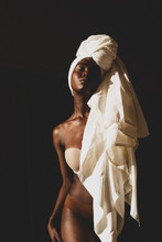 Model With Hair Wrapped In White Sheet