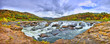 Panorama of Sandstone Falls in West Virginia with fall colors.