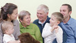 © MEDIAIMAG - Complete family portrait, children, parent and grandparents spend time together
