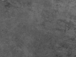 Clean gray industrial concrete wall texture as background.