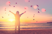 Copy Space Of Woman Raise Hand Up On Sunset Sky At Beach And Island Background.