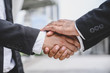 © Nopphon - Business people shake hands To make a business proposal agreement Went well