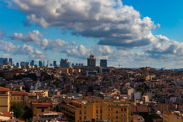 Wall Mural - Aerial View from the Galata Tower to rows of residential buildings in a district on a bright cloudy day with vintage look on the image.