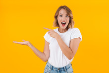 Image Of Optimistic Blond Woman Smiling And Pointing Finger At Copyspace Palm