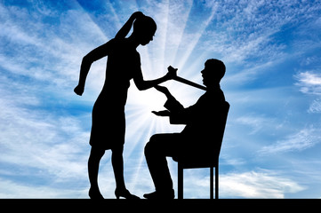 Wall Mural - Silhouette of a standing woman holding a tie for a man who is sitting on a chair