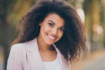 Poster - Close up photo of amazing pretty dark skin lady toothy smiling spending adorable free time walking green park outside gold autumn weather season wearing jacket