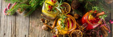 Autumn Winter Sangria, Mulled Wine Or Hot Spiced Cider Cocktails. Red, White And Orange Hot Winter Drinks And Beverages, In Glass Mason Jar Mugs With Spices And Citrus Fruit. Om Christmas Decorated Ru