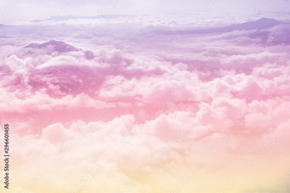 beautiful fantasy pastel clouds againt with top of hill as paradise background - obrazy, fototapety, plakaty 