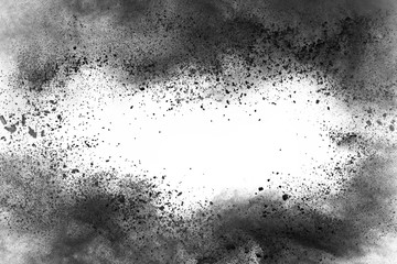 Canvas Print - particles of charcoal on white background,abstract powder splatted on white background,freeze motion