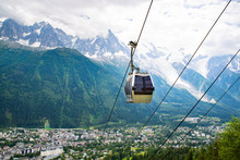 Cable Car Travelling Over Chamonix In Mont Blanc Area In France