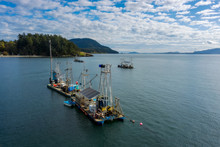 Reefnet Salmon Fishing Boats Off The Coast Of Lummi Island, Washington. Located In The Puget Sound Area Of Washington State, Reefnet Salmon Fishing Is The Most Sustainable Fishing Method In Use Today.