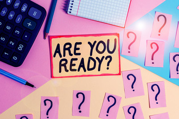 Text sign showing Are You Ready Question. Business photo text used telling someone start something when feel prepared Mathematics stuff and writing equipment above pastel colours background