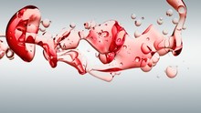Transparent Red Oil Bubbles And Fluid Shapes In Purified Water On A White Gradient Background. Side Angle With Crystal Colored Bubbles In Purified Water Cosmetic Backdrop With Copy Space For Science A