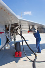 Refueling Of Military Aircraft In Airport. Preparations For Flight