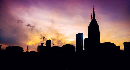 Wall Mural - Background silhouette of city building on colorful twilight sky Nashville Tennessee, USA