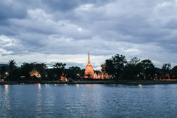 Wall Mural - Sukhothai Historical Park in Thailand Sukhothai historical park. Buddhist temple ruins Wat Maha That or the Monastery of the Great Relic is