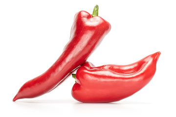 Group of two whole sweet red bell pepper isolated on white background