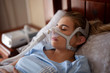 © Hope - Cpap machine, Woman using sleeping sleep apnea
