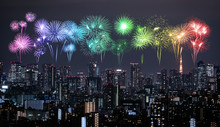 Fireworks Over Tokyo Cityscape At Night, Japan