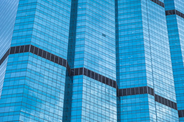 Blue glass windows of modern office building