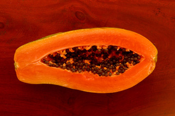 Wall Mural - Macro photo of an exotic papaya fruit. Papaya seeds.