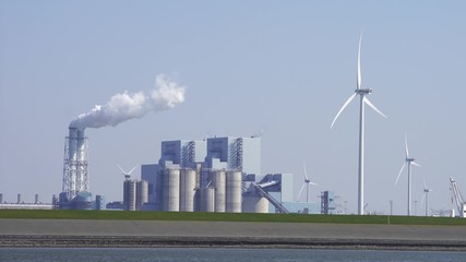 Fototapete - Fossile fuel (coal) power station and wind turbines. Eemshaven, Groningen, Holland.