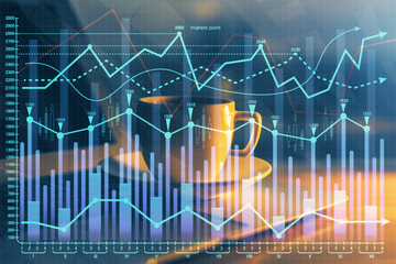 Financial chart drawing and table with computer on background. Multi exposure. Concept of international markets.