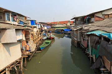 Wall Mural - Beautiful view of generic homes at the waterfront in the old Sunda Kelapa harbor area in Jakarta, Indonesia