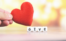 Give Love With Red Heart In Hand For Donate And Philanthropy Health Care Love Organ Donation Family Insurance World Heart Day World Health Day - Concepts Of Sharing Giving Or Valentines Day