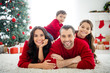 © deagreez - Portrait of four nice attractive sweet peaceful cheerful affectionate big full foster family mom dad celebrating newyear december tradition enjoying rest relax light white interior living-room